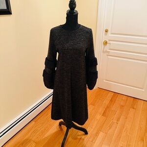 Chic Long Sleeve Black with Silver Lurex Material.Sleeves with Fur design.